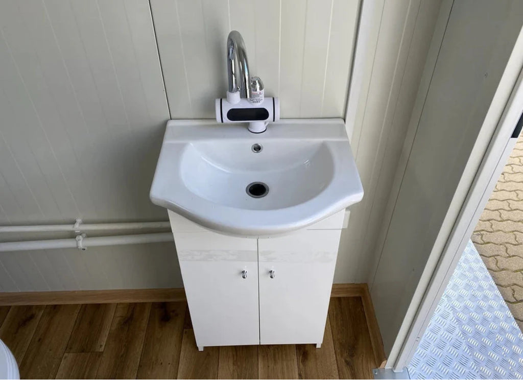 Cabina de aseo doble con tanque séptico

Modelo de madera de alta gama